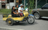 Philippines, Mindanao, family on tricycle